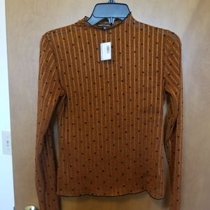 Semi-sheer textured mockneck